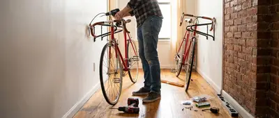 Install a Sturdy Wall-Mounted Bike Rack to Free Up Floor Space